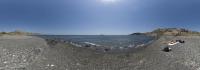 The beach of black smooth stones near Akrotiri