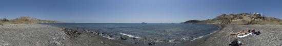 The beach of black smooth stones near Akrotiri