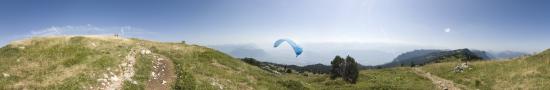 Paraglider flight at the top of Granier